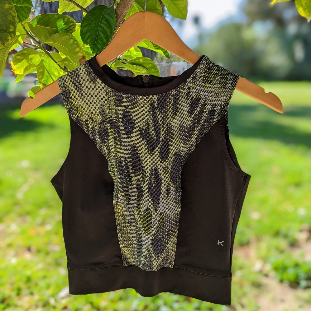 Koral Activewear "Pare" crop top with snake print design. 🐍
